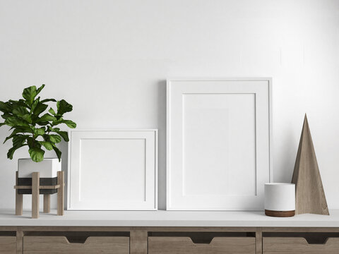 Mockup 2 picture frames, plant and decoration on a white sideboard, 3d rendering, 3d illustration