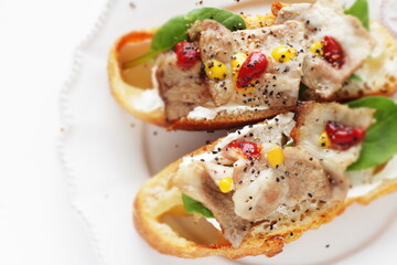 Barbecue pork belly and lettuce on French bread for delicious open sandwich image