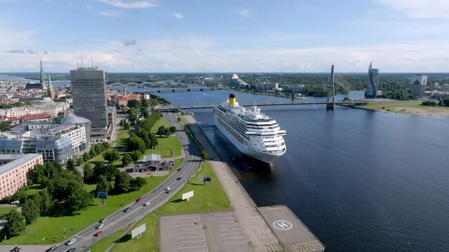 Beautiful cruise ship docked in Riga, Latvia near the old town and the bridge. Cruise in Latvia.