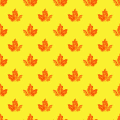 Seamless pattern with orange autumn leaves on a yellow background.