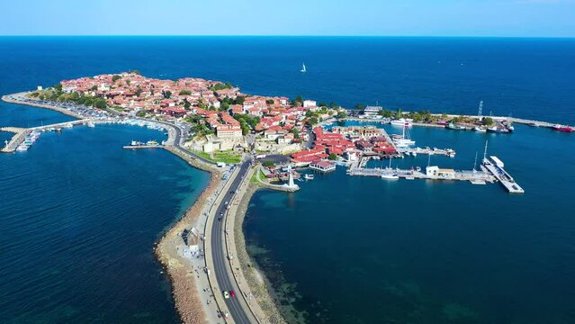 Flying drone over Nesebar island city on Bulgaria Black Sea coast, medieval Mesembria.