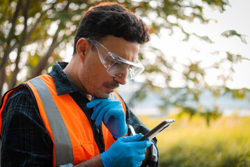 Scientists team collect water samples for analysis and research on water quality, environment with...