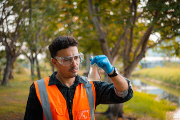 Scientists team collect water samples for analysis and research on water quality, environment with...