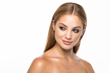 Fototapeta premium Young pretty woman touching her face isolated on white background