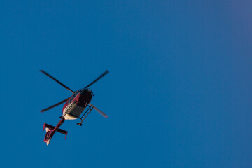 Naklejka na ściany i meble helicopter flying in the sky
