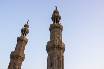 Fototapeta premium Minarets of mosque of al-Mu'ayyad on top of Bab Zuwaila, Cairo, Egypt