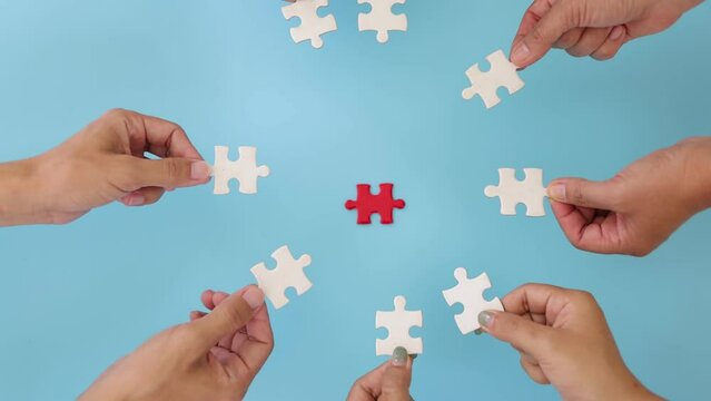 Business team connect puzzle pieces white blue background unity cooperation concept