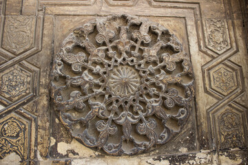 Floral Ornaments patterns carved into the exterior wall of Sultan Hasan Mosque, Cairo, Egypt