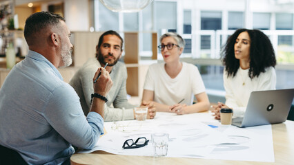 Group of design professionals having a meeting in an office
