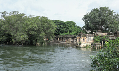 An Old Hindu temple building is seen submerged in flood water due to the torrential rains in Monsoon near Mysore, India.