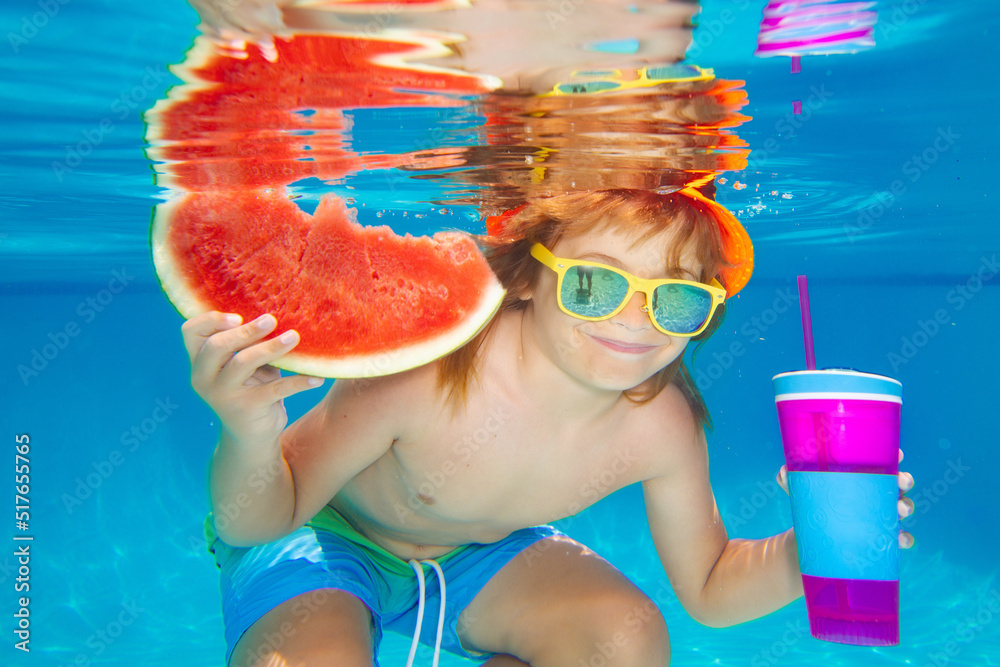 Wall mural summer kids portrait in pool water. kid swimming in pool underwater. child boy swim under water in s