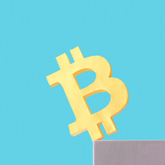 Bitcoin business crypto money and virtual internet currency is teetering on the plane and may fall. Minimal trend creative concept of crisis and success and loss and profit.