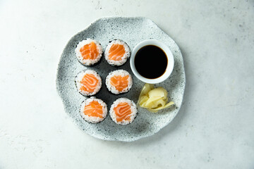 Homemade salmon maki rolls with soy sauce © marysckin