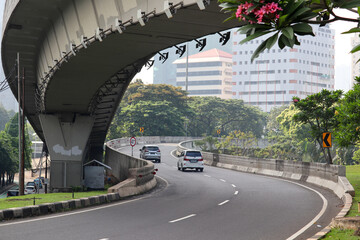selective focus frog view of construction of curved overpass at Semanggi intersection jakarta