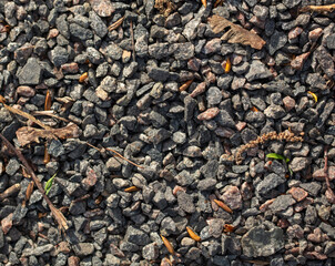 Small pebbles of crushed stone as an abstract background.