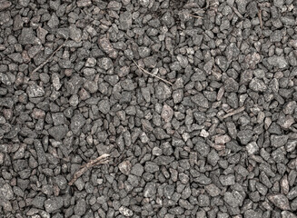 Small pebbles of crushed stone as an abstract background.