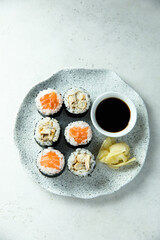 Healthy sushi rolls with salmon and eel