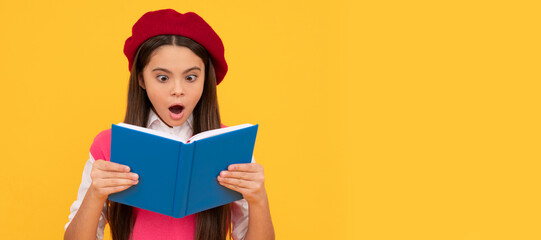 surprised teen school girl in french beret reading book on yellow background, surprise. Portrait of schoolgirl student, studio banner header. School child face, copyspace.