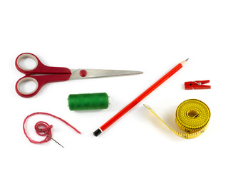 Set of accessories for sewing from a needle and a spool of thread with scissors