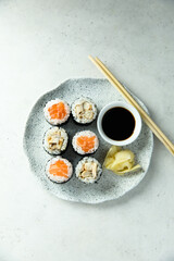 Healthy sushi rolls with salmon and eel