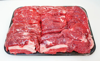 raw wagyu yakiniku cr, beef meat for cooking on background, closeup.
