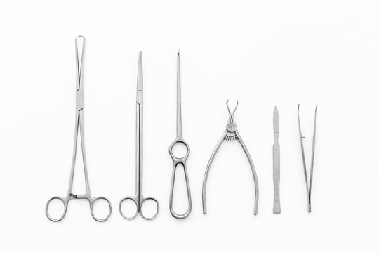 Flat lay of medical steel equipment tools for surgery or dentistry