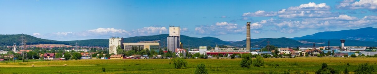 Fototapeta na wymiar Panoramic landscape of the industrial area in the city of Reghin - Romania