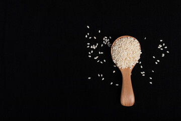 white sesame on black background