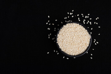 white sesame on black background