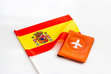Flag of Spain with passport. Travel visa and citizenship concept