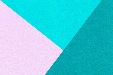 Texture of craft cyan, turquoise and pink shade color paper background, macro. Vintage abstract cerulean cardboard