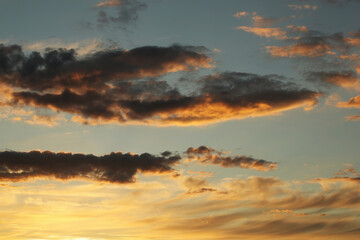 Fototapeta premium Sunset sky with dark clouds. Photo was taken 16 July 2022 year, MSK time in Russia.