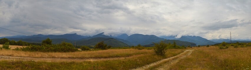 Fototapeta na wymiar Transfegerash panoramic view of the mountains in the clouds