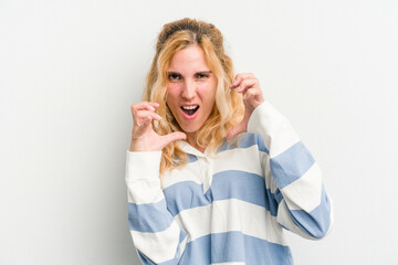 Young caucasian woman isolated on white background screaming with rage.