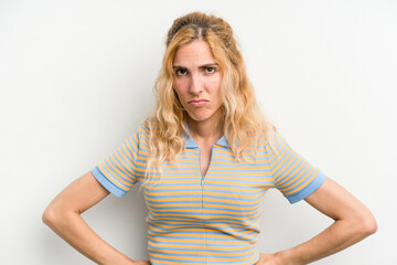 Young caucasian woman isolated on white background sad, serious face, feeling miserable and displeased.