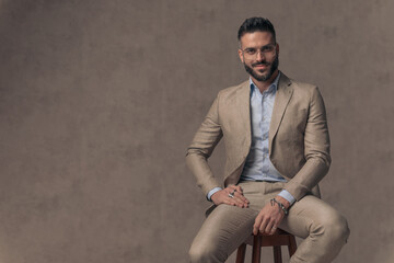 handsome happy guy in suit with open collar shirt smiling