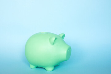 Piggy bank highlighted on a blue background