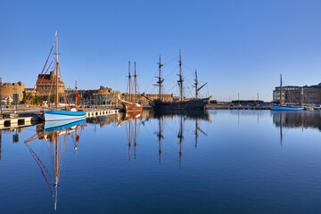 Image of St Malo pool with sailing ships