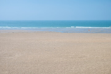 beach empty and quiet on a summer's day in the morning, calm concept