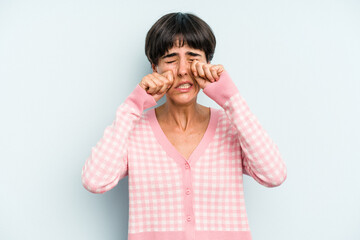 Young caucasian woman with a short hair cut isolated whining and crying disconsolately.