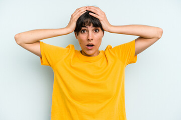 Young caucasian woman with a short hair cut isolated surprised and shocked.