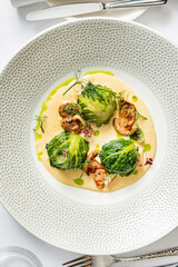 stuffed cabbage rolls with mushroom sauce