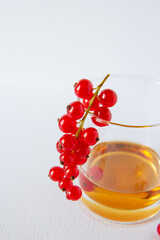 berries and a glass of alcohol