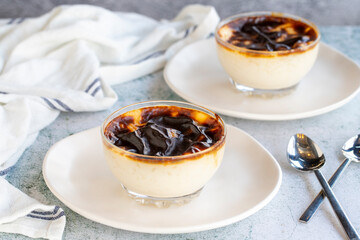 Rice pudding. Rice pudding dessert made of milk, sugar and rice on a stone background. Turkish cuisine delicacies. close up