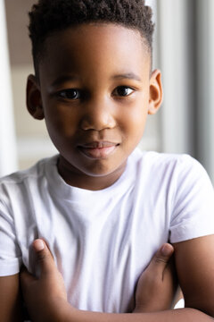 Portrait of happy and smiling african american boy at home