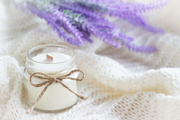 Obraz na płótnie Canvas Handmade soy wax candle with lavender flowers