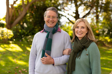 Fototapeta premium Image of happy caucasian senior couple in garden