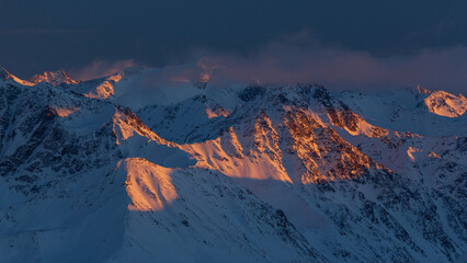 Burning sunset over winter ridge