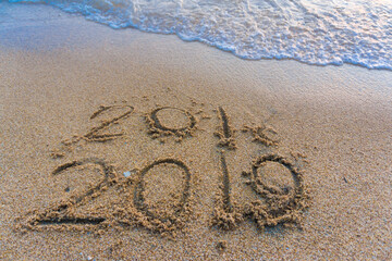 2019 Number on sea beach wave Happy new year concept background