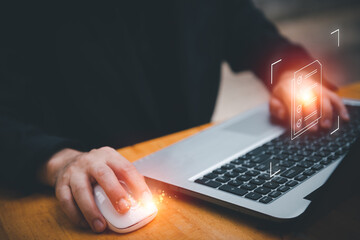 A man uses a smartphone to access an online document database. and automated processes to store files and documents in the organization effectively with enterprise business ERP technology